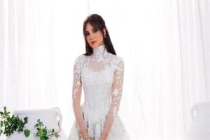 ظهرت بفستان زفاف.. حقيقة زواج آمال ماهر
